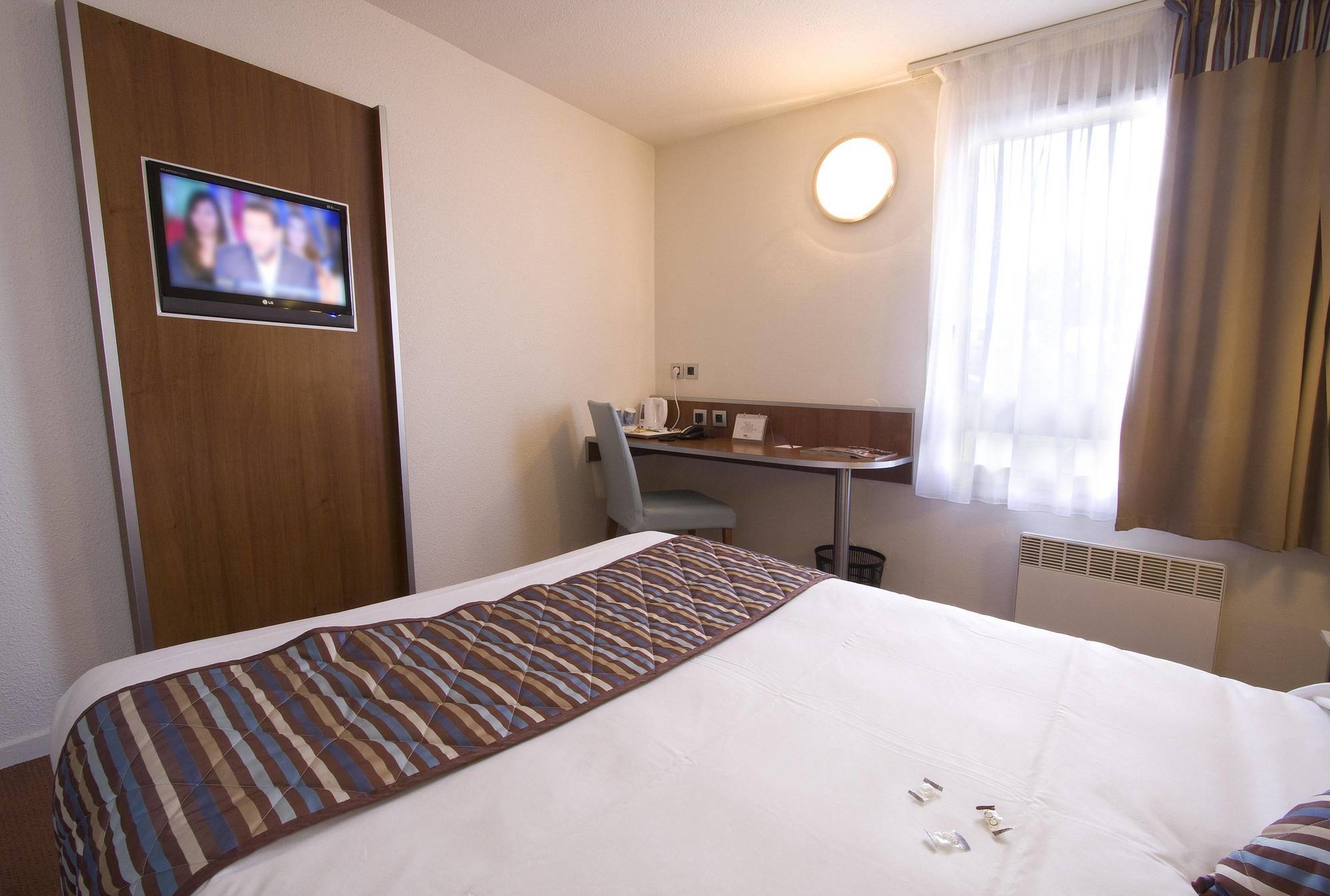 Comfort Hotel Linas - Montlhery Bagian luar foto
